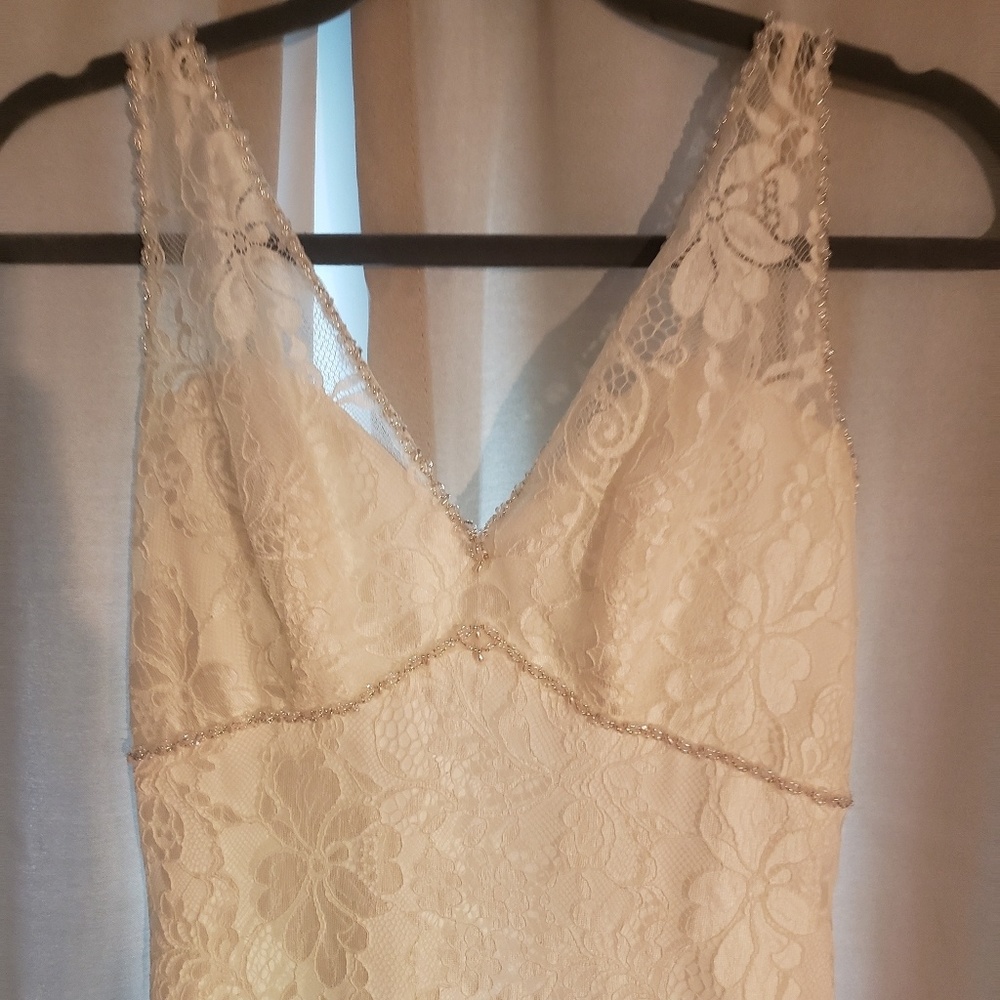 Ivory lace buttoned wedding dress Mori Lee
